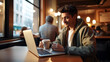 © bagotaj - A handsome smiling man sitting in a coffee shop. Working, studying, concentrating on his laptop screen. Achieve a goal, target or finish a task or success concept made by Generative AI.
