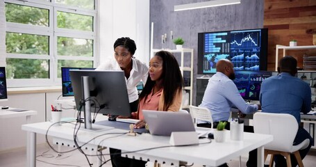 Poster - African Financial Data Analysts Using Dashboard On Screens