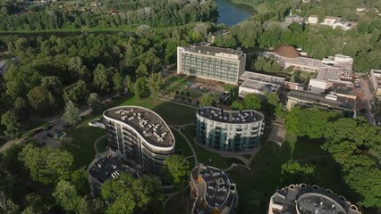 Wall Mural - Aerial view of Lithuanian resort Druskininkai. Panoramic view of Lithuanian resort Druskininkai church in city park. A spa town on the Nemunas river