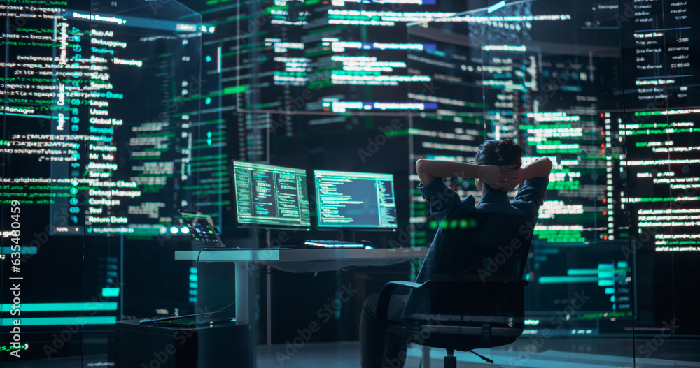 Female Developer Happily Resting After Successfully Typing on Computer Properly Functioning Back-end Code. Professional Programmer Surrounded by Big Screens Showing Coding Language, Creating Software.