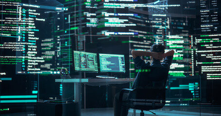 Female Developer Happily Resting After Successfully Typing on Computer Properly Functioning Back-end Code. Professional Programmer Surrounded by Big Screens Showing Coding Language, Creating Software.