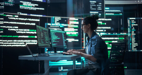 Leinwandbilder - Portrait of Woman Working on Computer, Typing Lines of Code that Appear on Big Screens Surrounding her in a Monitoring Room. Female Programmer Creating Innovative Software Using AI Data and System