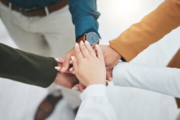 Stack, team building or hands of business people for goal, mission or collaboration with support. Partnership, closeup or top of colleagues in meeting huddle for vision plan, motivation or solidarity