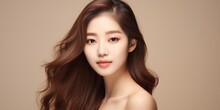 Young Beauty With Curly Long Hair With Korean Make-up Style.