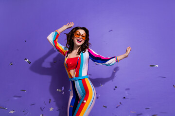 Poster - Photo of pretty sweet girl dressed striped overall dark eyewear having disco fun isolated violet color background