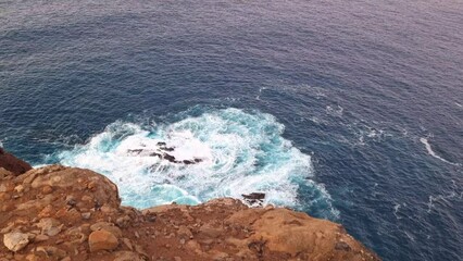 Wall Mural - Slow motion of crashing waves on rocks