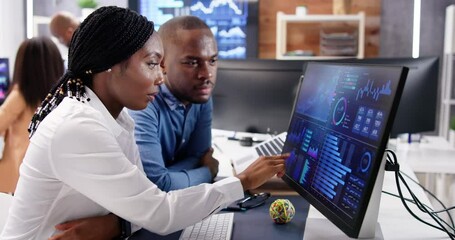 Poster - African Financial Data Analysts Using Dashboard On Screens