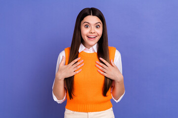 Sticker - Photo of cheerful impressed girl toothy smile hands touch chest cant believe isolated on violet color background