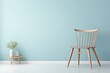 © 2rogan - Minimalist a wooden chair in a Scandinavian living room mockup with a pastel blue background.