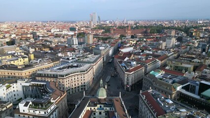 Wall Mural - Europe, Italy , Milan - Drone aerial view of Milan downtown city center - Cordusio , Sforza Castle and Citylife district during sunrise - Tourist attraction and sightseeing 