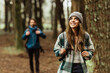 © Prostock-studio - Glad inspired young caucasian couple in jackets walk in forest together, enjoy trip, outdoor, blurred