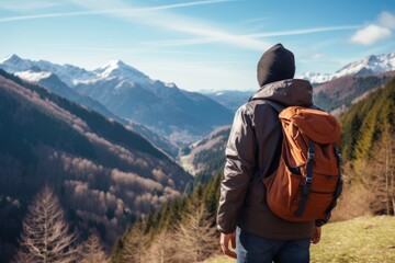 Wall Mural - Unrecognizable Young Man With Backpack Hiking