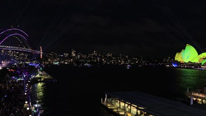 Sticker - Vivid Sydney night time light show projection on city architecture landmark 4k.
