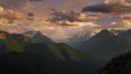 Wall Mural - beautiful sunset in the smoky mountains, caucasus, russia, timelapse 4k