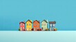 Group of different type of small house on blue background 