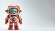 © Liana - Detailed toy astronaut with red suit and large helmet, standing confidently against a white backdrop.