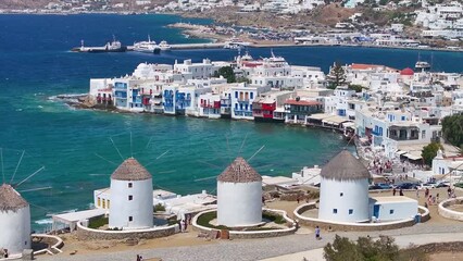 Wall Mural - aerial view through the famous windmills above mykonos town, cyclades, greece, to the little venice 