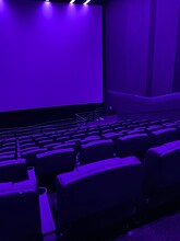 Empty cinema. Empty movie theatre. Modern movies theater for festivals and films presentation. Interior design. Online cinema concept.