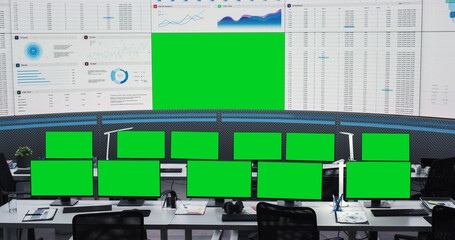 Aufkleber - Empty Modern Monitoring Office With Green Screen Chromakey On Big Digital Screen And Desktop Computer Monitors Of Employees. Mockup Template Of Successful AI Or Deep Learning Company Workspace.