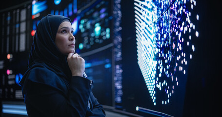 Leinwandbilder - Talented Muslim Software Programmer Working in Technological Innovative Agency Startup. Young Female Manager Dealing with Cloud Based Neural Network Research and Development