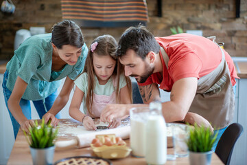 Canvas Print - Family having fun in kitchen