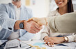Business people, handshake and meeting in teamwork, hiring or partnership together at office. Closeup of employees shaking hands in team agreement, b2b deal or thank you in recruiting at workplace