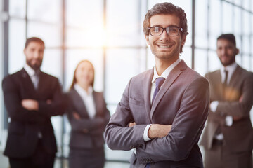 Head shot portrait diverse employees standing in office, posing for photo