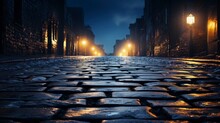 Wet cobblestone street at night