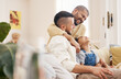 © Wesley/peopleimages.com - Gay, happy family and a child hug on a home sofa with love, care and safety in a lounge. Lgbtq men, adoption and parents with a foster girl kid together on a couch for happiness, bonding and to relax