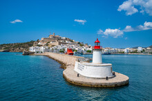 Harbour Lighthouse And The Old Town Of Ibiza With Its Castle Seen From The Harbor, UNESCO World Heritage Site, Ibiza, Balearic Islands, Spain, Mediterranean