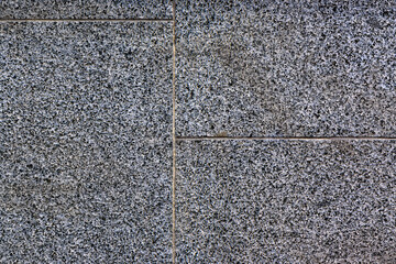 wall lined with granite slabs as a background 2