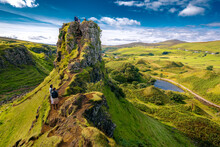 Tourists Explore Fairy Glenn, Isle Of Skye, Inner Hebrides, Scotland, United Kingdom