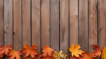 Fall Leaves Bordering A Wooden Fence, Thanksgiving Background, Wide Banner With Copy Space Area Generative AI