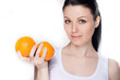 © jeny_lk - Young happy woman with oranges on isolated background.