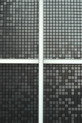 Sticker - Vertical shot of a black and white tiled wall in Korea