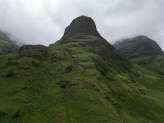 Poster - Aerial view of the Three Sisters mountain range in Glencoe, Scotland