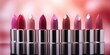 © 22_monkeyzzz - A lot of pink lipsticks on blurred pink background. Generative AI