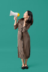 Sticker - Beautiful Asian woman with megaphone on green background. Dialogue concept