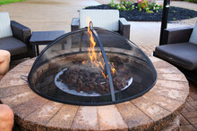 Covered Brick Fire Pit On A Patio At A Hotel