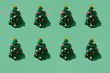 Pattern Background Of Christmas Trees On Green