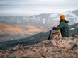 © Ivan Haidutski/Stocksy - Adventurous Female Hiker Enjoying Scenic View on Volcanic Mountain