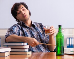 Poster - Male teacher drinking in the classroom