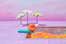 Rubber Duck On Diving Board Of Swimming Pool.