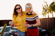 © Lindsey Rivera/Stocksy - Happy Couple at Summer Party