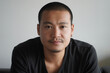 © Demetr White/Stocksy - portrait of a man looking at the camera