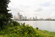 © Hernandez & Sorokina/Stocksy - Skyscrapers Of Singapore Framed By Observation Wheel