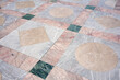 © Ana Blizzard/Stocksy - Marble floors with pastel colored shapes