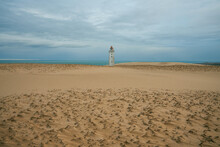 Scenic View Of Rubjerg Knude Lighthouse Among Sand Dunes 