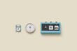 © Yaroslav Danylchenko/Stocksy - Retro, alarm, modern and calendar clocks in a row.