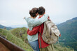 © AD Astra Team/Stocksy - A couple of female travelers in the mountains